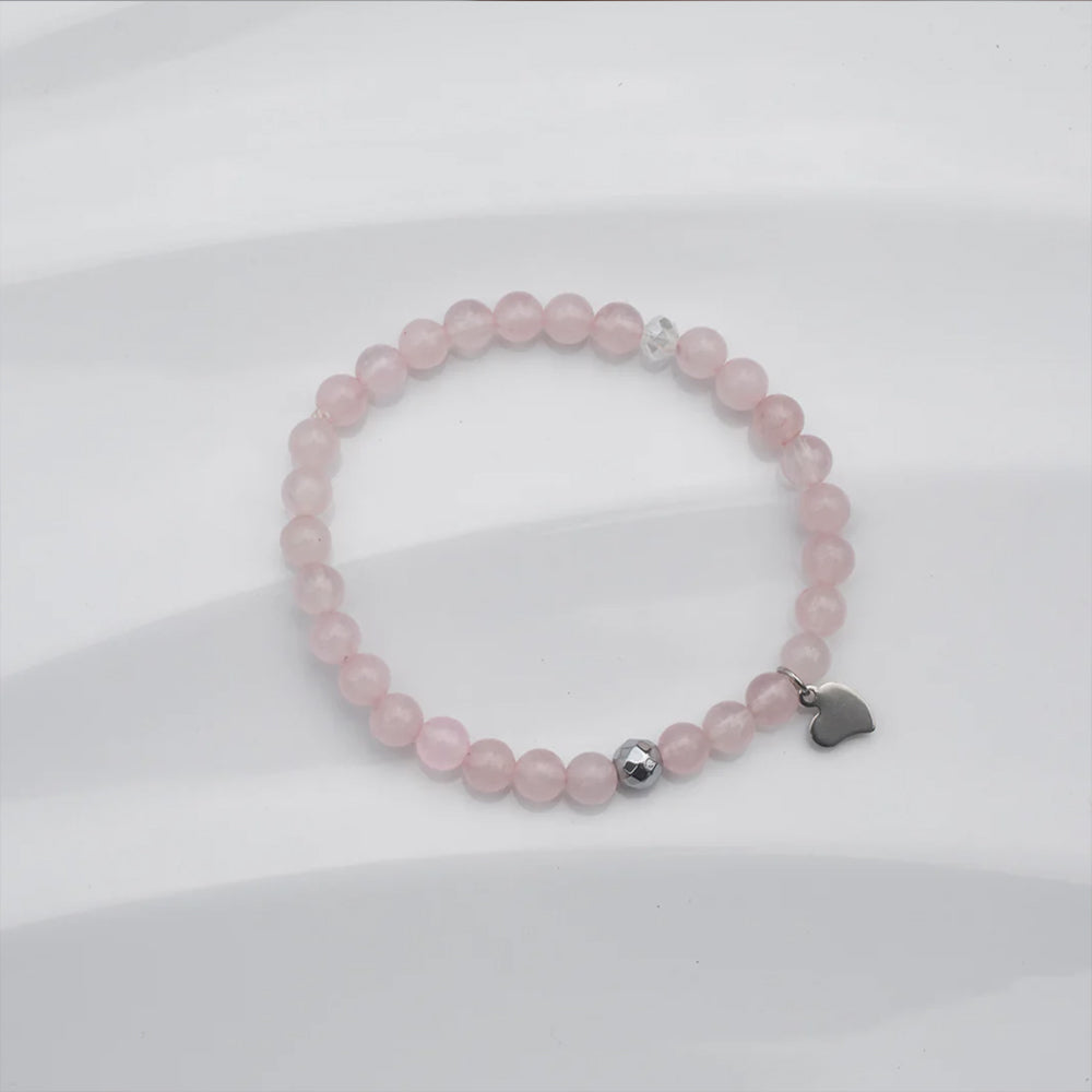 
                  
                    Bracelet de quartz rose et hématite argent avec breloque en coeur
                  
                
